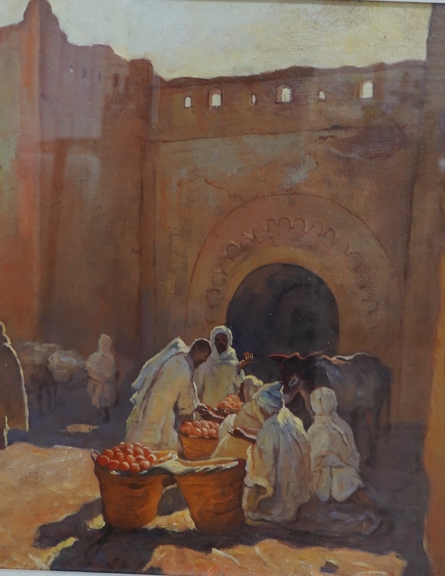 A decorative Orientalist style oil on board, Figures and donkey before an archway, 49 x 40cm. Condition - good